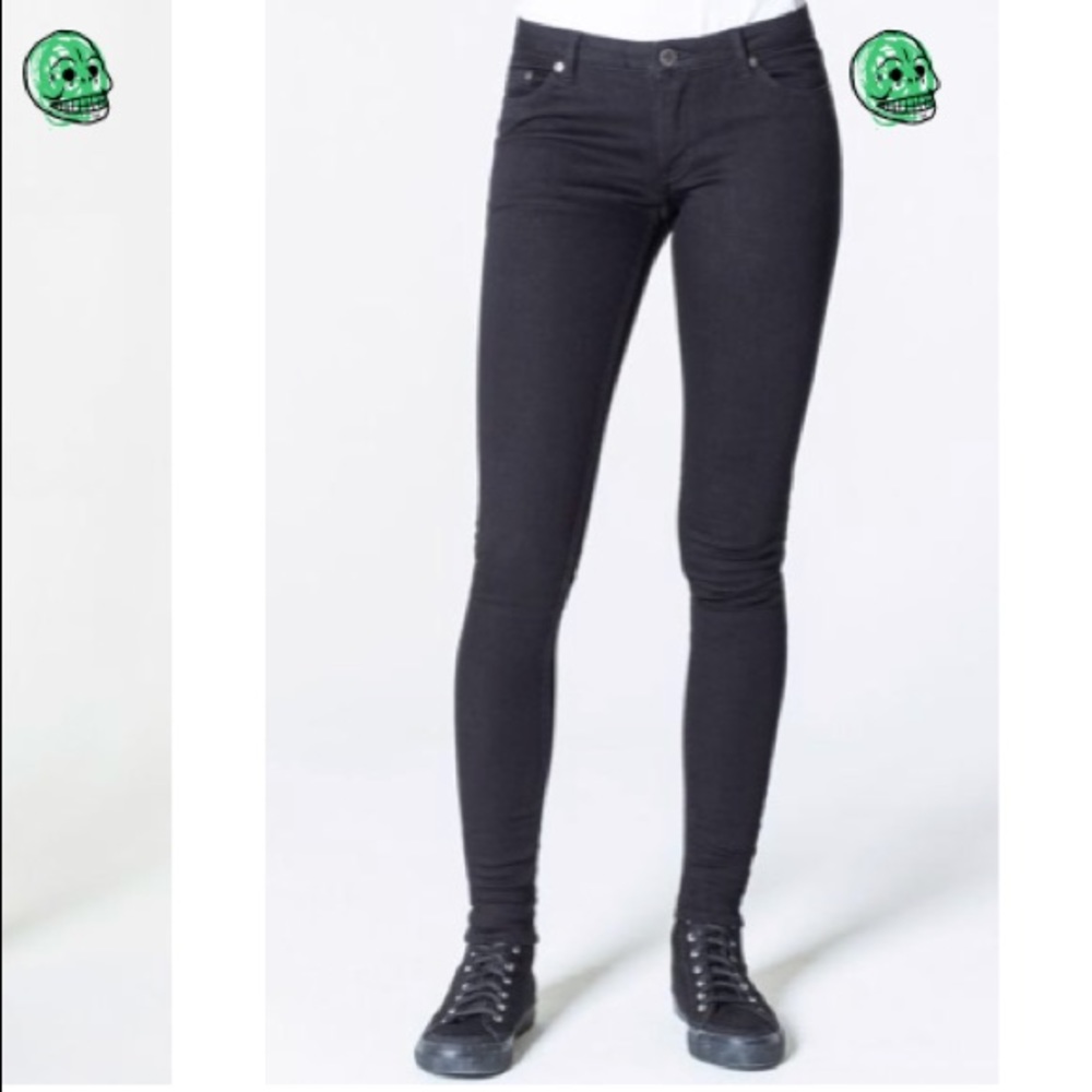Cheap Monday spray on black jeans